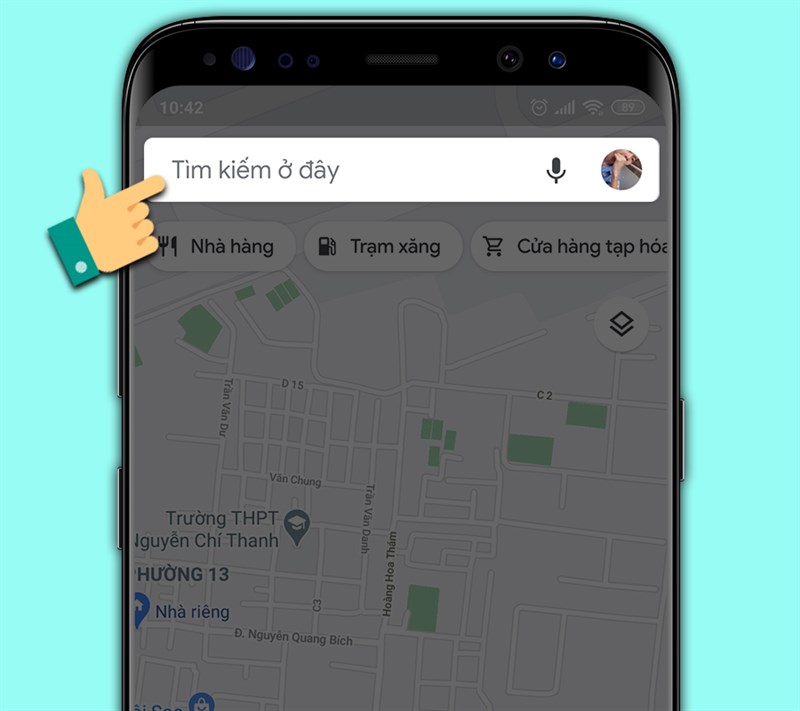 Ảnh chụp màn hình thanh tìm kiếm của Google Maps, với dòng chữ "Tìm kiếm ở đây" và biểu tượng kính lúp. Alt: Nhập địa điểm bạn muốn đến vào thanh tìm kiếm của Google Maps để bắt đầu hành trình.